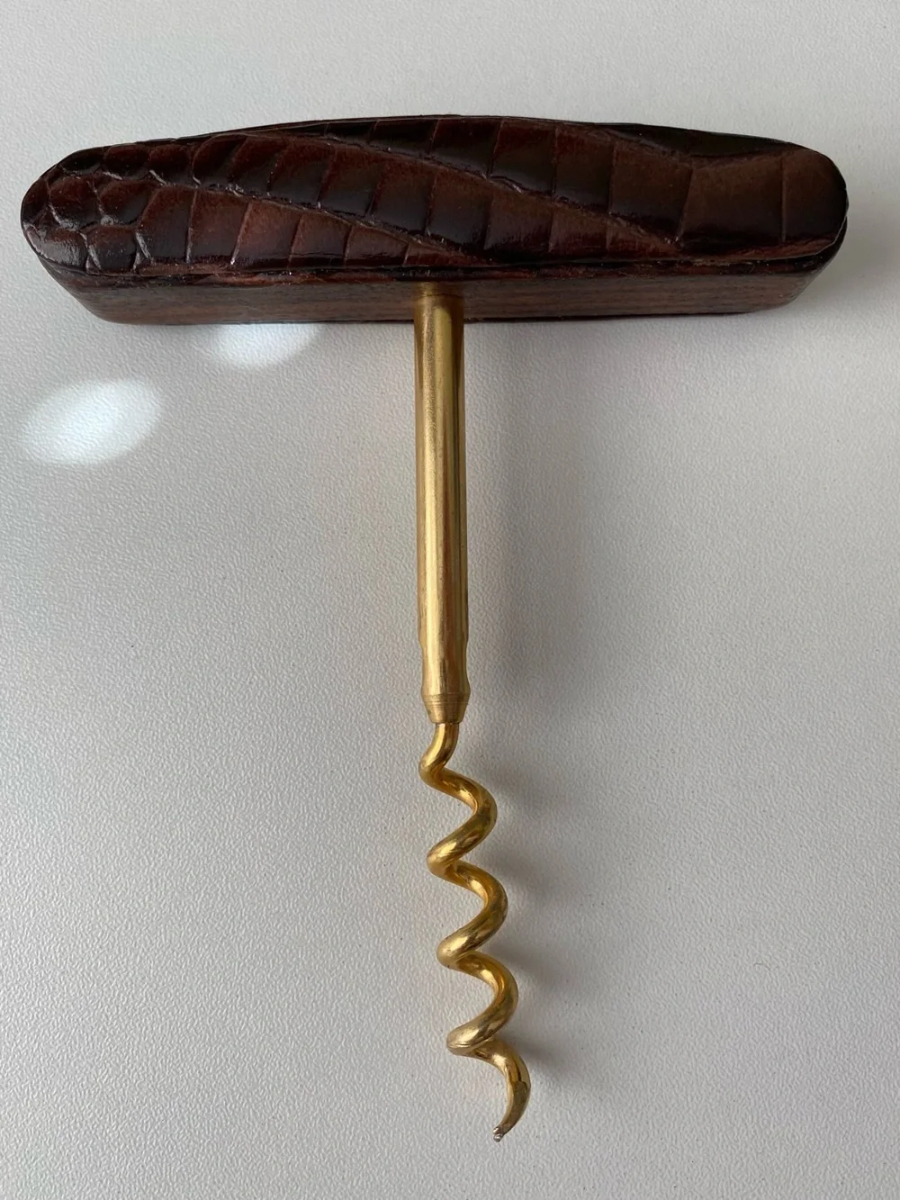 Vintage mid-century brass and faux-crocodile leather bar set.